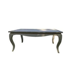 Table on bent legs in a rustic style.