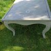 Table on bent legs in a rustic style. Table on bent legs in a rustic style.