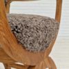 1960s, Danish design by Henning Kjærnulf, chair model "Kurul", sheepskin, oak wood.