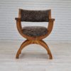 1960s, Danish design by Henning Kjærnulf, chair model "Kurul", sheepskin, oak wood.