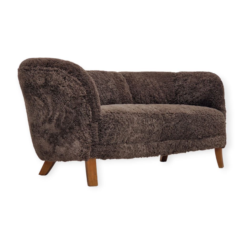 60s, Danish design, renovated seater “Banana” sofa, genuine sheepskin.